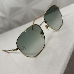 Gucci unisex gold frame sunglasses green lenses